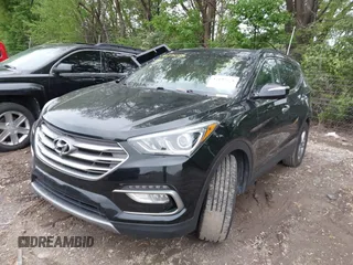 2017 Hyundai Santa Fe 2.4L z VIN 5XYZU3LB2HG434503, wystawiony jako IAAI lot #42197574 z przebiegiem 99 167 mil mil oraz . Historia ofert i sprzedaży dostępna na DreamBid. Obrazek 2.
