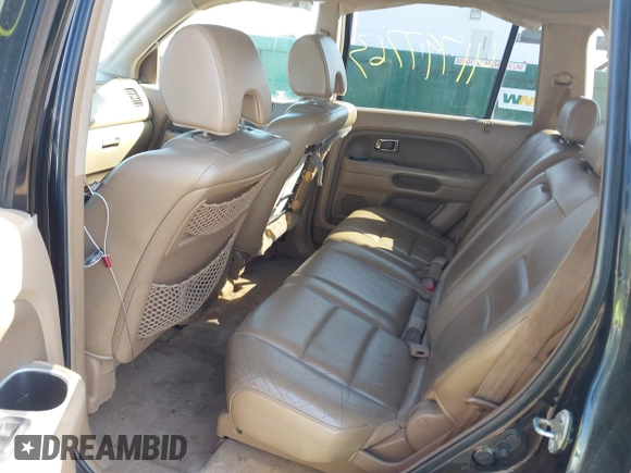 2006 Honda Pilot EX-L with VIN 5FNYF18766B008879, listed as a IAAI auction lot 41797763 with 398,242 mi miles and . Bid and sale history available at DreamBid. Image 8.