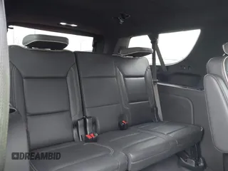 2023 Chevrolet Suburban Premier z VIN 1GNSCFKD8PR362870, wystawiony jako IAAI lot #42148476 z przebiegiem 54 983 mil mil oraz . Historia ofert i sprzedaży dostępna na DreamBid. Obrazek 18.