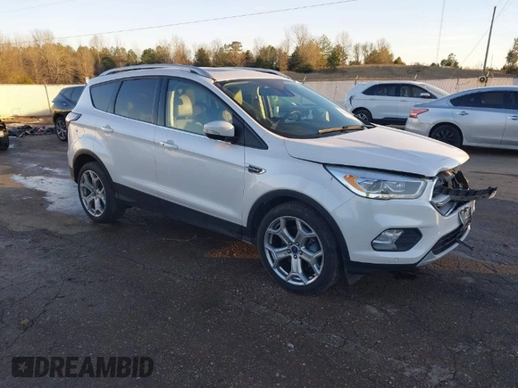 2017 Ford Escape Titanium with VIN 1FMCU0J98HUA75690, listed as a IAAI auction lot 41358534 with 90,376 mi miles. Bid and sale history available at carsss.com. Image 1.