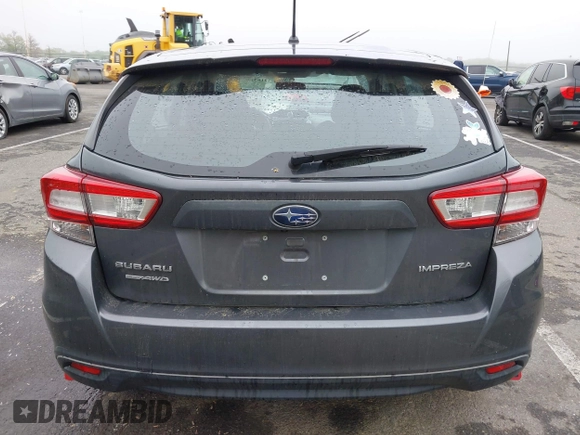 2019 Subaru Impreza with VIN 4S3GTAA69K1711062, listed as a IAAI auction lot 42187136 with 91,423 mi miles and . Bid and sale history available at DreamBid. Image 16.