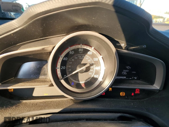 2015 Mazda 3 i Grand Touring z VIN JM1BM1W76F1225419, wystawiony jako Copart lot #74278093 z przebiegiem 102 059 mil mil oraz Szkoda całkowita • Salvage title. Historia ofert i sprzedaży dostępna na DreamBid. Obrazek 9.