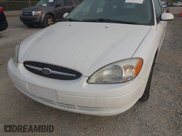 2003 Ford Taurus SE z VIN 1FAFP58S63A158422, wystawiony jako IAAI lot #41933813 z przebiegiem 71 990 mil mil oraz . Historia ofert i sprzedaży dostępna na DreamBid. Obrazek 6.