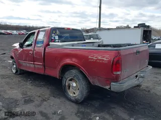 2000 Ford F-150 XL with VIN 1FTRX18W8YNB08110, listed as a IAAI auction lot 41701007 with 92,783 mi miles. Bid and sale history available at carsss.com. Image 3.