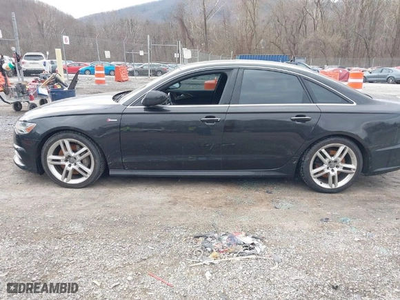2016 Audi A6 3.0T Premium Plus with VIN WAUFGAFC9GN071253, listed as a IAAI auction lot 41645273 with NaN miles. Bid and sale history available at carsss.com. Image 14.