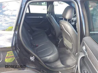 2016 BMW X1 xDrive28i with VIN WBXHT3Z3XG4A48557, listed as a IAAI auction lot 41387960 with 84,821 mi miles. Bid and sale history available at carsss.com. Image 8.