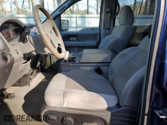 2007 Ford F-150 XLT with VIN 1FTPW02507KC10165, listed as a Copart auction lot 42901335 with 232,990 mi miles and Salvage title. Bid and sale history available at DreamBid. Image 7.