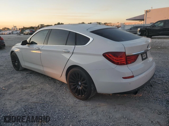 2013 BMW 5 Series 535i Gran Turismo with VIN WBASN2C51DC202893, listed as a Copart auction lot 82587944 with 119,904 mi miles and Salvage title. Bid and sale history available at DreamBid. Image 2.