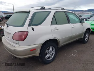 1999 Lexus RX 300 Luxury SUV with VIN JT6HF10U3X0033392, listed as a IAAI auction lot 41165188 with 233,343 mi miles. Bid and sale history available at carsss.com. Image 4.