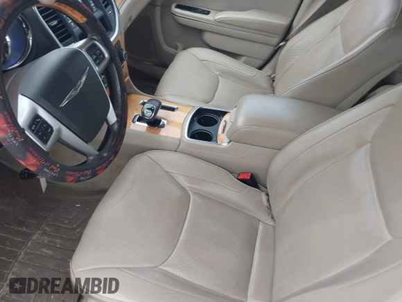 2012 Chrysler 300 Limited with VIN 2C3CCACG5CH129861, listed as a IAAI auction lot 41891121 with 146,141 mi miles. Bid and sale history available at carsss.com. Image 12.