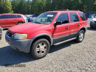 2002 Ford Escape XLT Choice with VIN 1FMCU04122KB12659, listed as a Copart auction lot 63816155 with 256,536 mi miles and Salvage title. Bid and sale history available at DreamBid. Image 1.