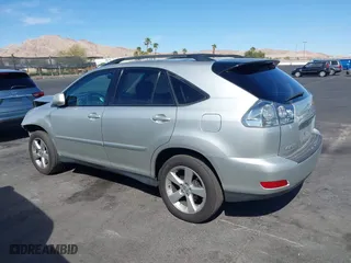 2005 Lexus RX 330 with VIN JTJGA31U350053732, listed as a IAAI auction lot 42014819 with 153,650 mi miles. Bid and sale history available at carsss.com. Image 3.