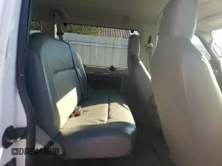 2010 Ford Econoline Passenger XL with VIN 1FMNE1BW2ADA11991, listed as a Copart auction lot 63758014 with 32,785 mi miles and Salvage Title. Bid and sale history available at DreamBid. Image 11.
