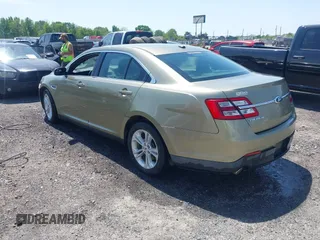 2013 Ford Taurus SEL with VIN 1FAHP2E88DG105557, listed as a IAAI auction lot 42040773 with 157,705 mi miles and . Bid and sale history available at carsss.com. Image 3.