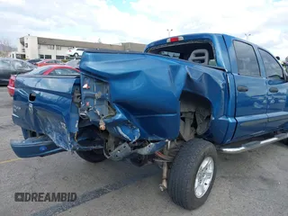 2005 Dodge Dakota SLT with VIN 1D7HE48N85S261745, listed as a IAAI auction lot 41401763 with 153,799 mi miles and . Bid and sale history available at DreamBid. Image 6.