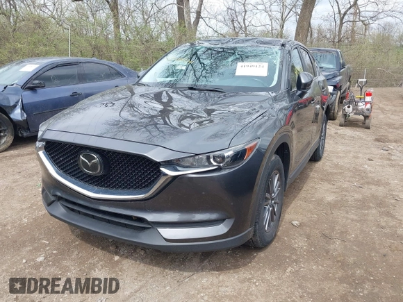 2020 Mazda CX-5 Touring with VIN JM3KFBCM1L0792396, listed as a IAAI auction lot 41949124 with 118,280 mi miles. Bid and sale history available at carsss.com. Image 2.