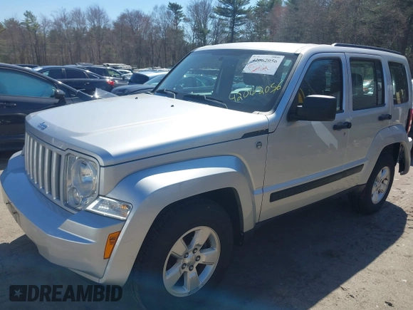 2011 Jeep Liberty Sport with VIN 1J4PN2GK9BW575064, listed as a IAAI auction lot 42062056 with 152,693 mi miles. Bid and sale history available at carsss.com. Image 2.