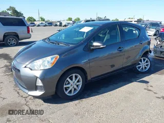 2014 Toyota Prius One z VIN JTDKDTB39E1078879, wystawiony jako IAAI lot #42201010 z przebiegiem 147 544 mil mil oraz . Historia ofert i sprzedaży dostępna na DreamBid. Obrazek 2.