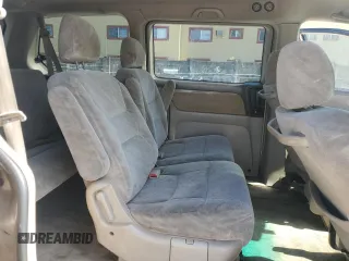 2004 Honda Odyssey EX-RES z VIN 5FNRL18814B125773, wystawiony jako Copart lot #58205565 z przebiegiem 250 732 mil mil oraz Szkoda całkowita • Salvage title. Historia ofert i sprzedaży dostępna na DreamBid. Obrazek 11.