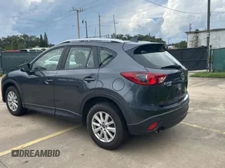 2013 Mazda CX-5 Sport with VIN JM3KE4BE7D0141588, listed as a Copart auction lot 66138585 with 124,920 mi miles and Clean title. Bid and sale history available at DreamBid. Image 3.