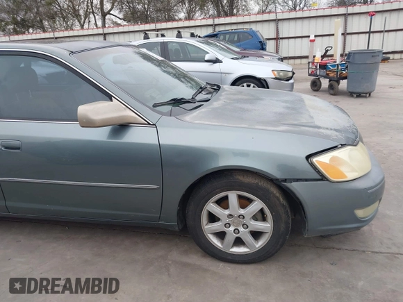 2002 Toyota Avalon XL with VIN 4T1BF28BX2U262186, listed as a IAAI auction lot 41572610 with 164,899 mi miles and . Bid and sale history available at DreamBid. Image 19.