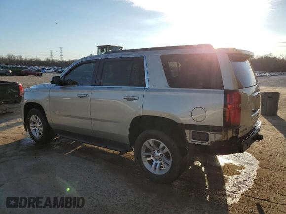 2016 Chevrolet Tahoe LT with VIN 1GNSKBKCXGR312880, listed as a Copart auction lot 45769255 with 180,025 mi miles and Salvage Title. Bid and sale history available at DreamBid. Image 2.