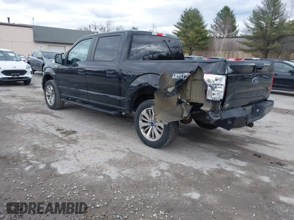2018 Ford F-150 XL with VIN 1FTEW1EP2JFC58602, listed as a IAAI auction lot 41861045 with 149,399 mi miles. Bid and sale history available at carsss.com. Image 3.