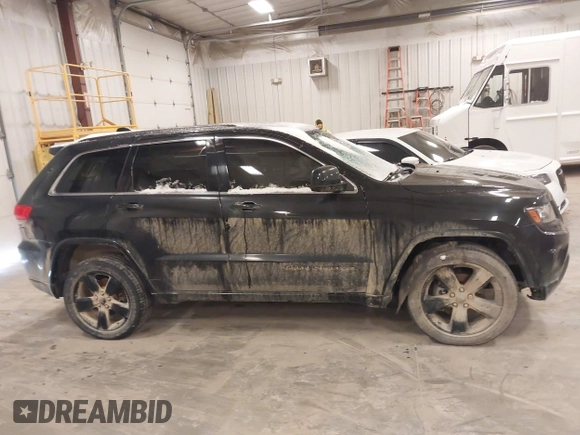 2015 Jeep Grand Cherokee Laredo with VIN 1C4RJFAG3FC607827, listed as a IAAI auction lot 41298397 with 198,171 mi miles. Bid and sale history available at carsss.com. Image 13.