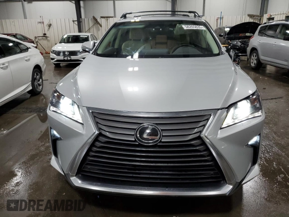 2017 Lexus RX 350 with VIN 2T2BZMCA6HC083229, listed as a Copart auction lot 58265835 with 61,548 mi miles and Salvage title. Bid and sale history available at DreamBid. Image 5.