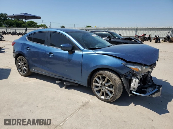 2018 Mazda 3 Touring z VIN 3MZBN1V35JM238103, wystawiony jako Copart lot #56770875 z przebiegiem 66 747 mil mil oraz Szkoda całkowita • Salvage title. Historia ofert i sprzedaży dostępna na DreamBid. Obrazek 4.