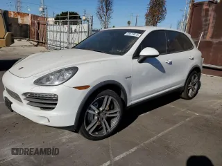 2012 Porsche Cayenne S Hybrid z VIN WP1AE2A23CLA93180, wystawiony jako Copart lot #88579675 z przebiegiem 50 909 mil mil oraz Tytuł czysty. Historia ofert i sprzedaży dostępna na DreamBid. Obrazek 1.