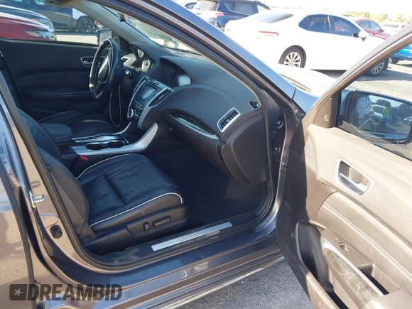 2020 Acura TLX w/Technology Pkg with VIN 19UUB2F45LA003302, listed as a IAAI auction lot 41738499 with 51,835 mi miles. Bid and sale history available at carsss.com. Image 5.