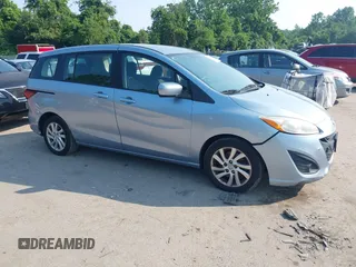2012 Mazda 5 Sport with VIN JM1CW2BL5C0109542, listed as a IAAI auction lot 42494218 with 248,428 mi miles and . Bid and sale history available at DreamBid. Image 1.