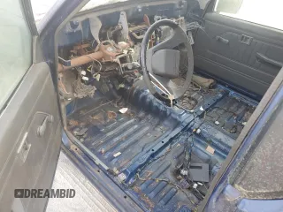 1995 Mitsubishi Mighty Max z VIN JA7LS21G4SP002839, wystawiony jako Copart lot #55777674 z przebiegiem Nie podano mil oraz Tytuł czysty. Historia ofert i sprzedaży dostępna na DreamBid. Obrazek 8.