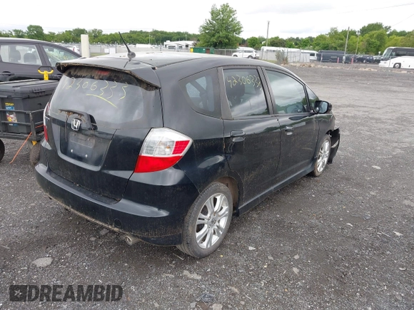 2009 Honda Fit Sport with VIN JHMGE88469S055316, listed as a IAAI auction lot 42306333 with 144,377 mi miles and . Bid and sale history available at DreamBid. Image 4.