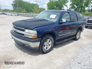2002 Chevrolet Tahoe LT z VIN 1GNEC13Z52R284289, wystawiony jako IAAI lot #42258446 z przebiegiem 194 503 mil mil oraz . Historia ofert i sprzedaży dostępna na DreamBid. Obrazek 2.
