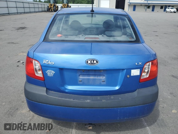2009 Kia Rio LX with VIN KNADE223696530633, listed as a Copart auction lot 68371794 with 165,505 mi miles and Salvage Title. Bid and sale history available at DreamBid. Image 6.