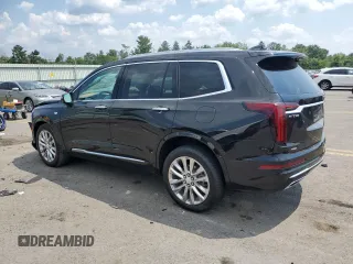 2023 Cadillac XT6 AWD Premium Luxury z VIN 1GYKPFRS7PZ225950, wystawiony jako Copart lot #65573174 z przebiegiem Nie podano mil oraz Szkoda całkowita • Salvage title. Historia ofert i sprzedaży dostępna na DreamBid. Obrazek 2.