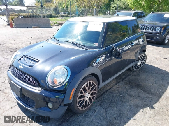 2009 MINI Hardtop S with VIN WMWMF73509TW82466, listed as a IAAI auction lot 42056740 with 113,755 mi miles and . Bid and sale history available at DreamBid. Image 2.