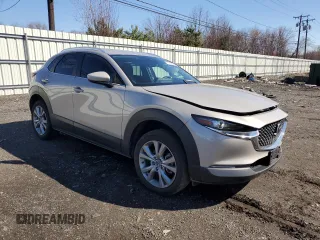 2023 Mazda CX-30 S Select with VIN 3MVDMBBM6PM577168, listed as a Copart auction lot 51258565 with 14,572 mi miles and Salvage Title. Bid and sale history available at DreamBid. Image 4.