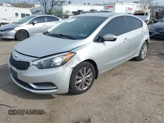 2014 Kia Forte LX with VIN KNAFX4A61E5081257, listed as a IAAI auction lot 42011042 with Not Provided miles and . Bid and sale history available at carsss.com. Image 2.