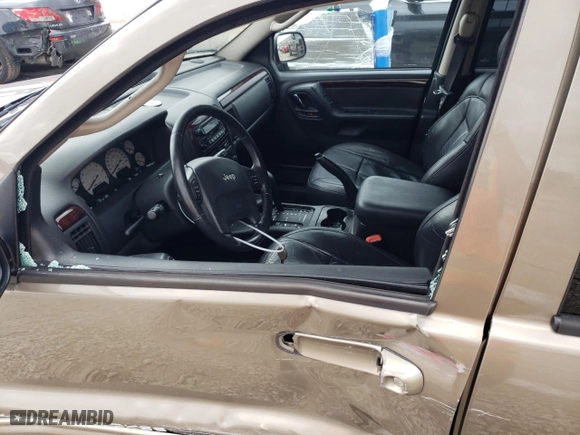 2004 Jeep Grand Cherokee Limited with VIN 1J8GW58N04C417707, listed as a Copart auction lot 53807104 with 185,966 mi miles and Salvage Title. Bid and sale history available at carsss.com. Image 7.