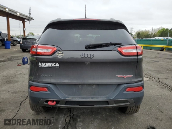 2016 Jeep Cherokee Trailhawk with VIN 1C4PJMBB0GW164437, listed as a Copart auction lot 54776985 with 158,801 mi miles and Salvage title. Bid and sale history available at DreamBid. Image 6.
