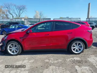 2021 Tesla Model Y Standard Range with VIN 5YJYGDED1MF111410, listed as a IAAI auction lot 41942323 with 24,836 mi miles. Bid and sale history available at carsss.com. Image 13.