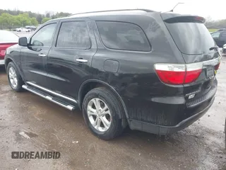 2013 Dodge Durango Crew with VIN 1C4RDHDG5DC613835, listed as a IAAI auction lot 41910643 with 155,827 mi miles and . Bid and sale history available at DreamBid. Image 3.