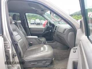 2004 Ford Explorer XLT z VIN 1FMDU73KX4UB18210, wystawiony jako IAAI lot #42504862 z przebiegiem 264 644 mil mil oraz . Historia ofert i sprzedaży dostępna na DreamBid. Obrazek 5.