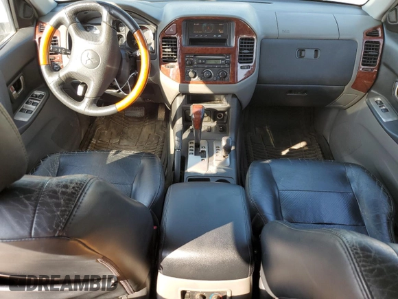 2003 Mitsubishi Montero LTD with VIN JA4NW51S53J043646, listed as a Copart auction lot 57050704 with 214,720 mi miles and Clean Title. Bid and sale history available at carsss.com. Image 8.