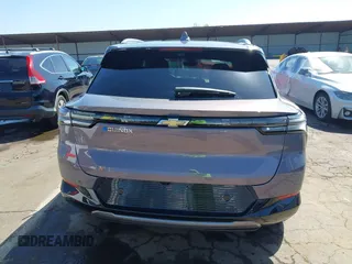 2025 Chevrolet Equinox EV LT z VIN 3GN7DLRP6SS145485, wystawiony jako IAAI lot #42014380 z przebiegiem 912 mil mil oraz . Historia ofert i sprzedaży dostępna na DreamBid. Obrazek 17.