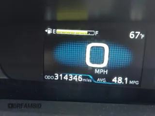 2021 Toyota Prius L Eco with VIN JTDKAMFU8M3144391, listed as a IAAI auction lot 42477718 with 314,346 mi miles and . Bid and sale history available at DreamBid. Image 16.
