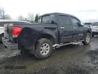 2005 Nissan Titan LE with VIN 1N6AA07B15N552302, listed as a Copart auction lot 44396985 with 172,401 mi miles and Salvage Title. Bid and sale history available at carsss.com. Image 3.